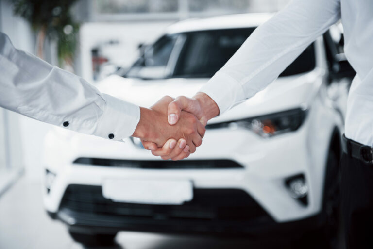 man shaking hand to another