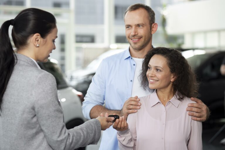 automotive dealer explaining customer