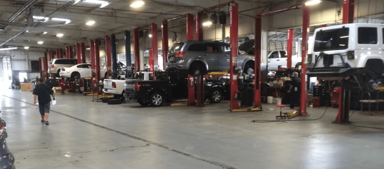 A garage filled with Cars