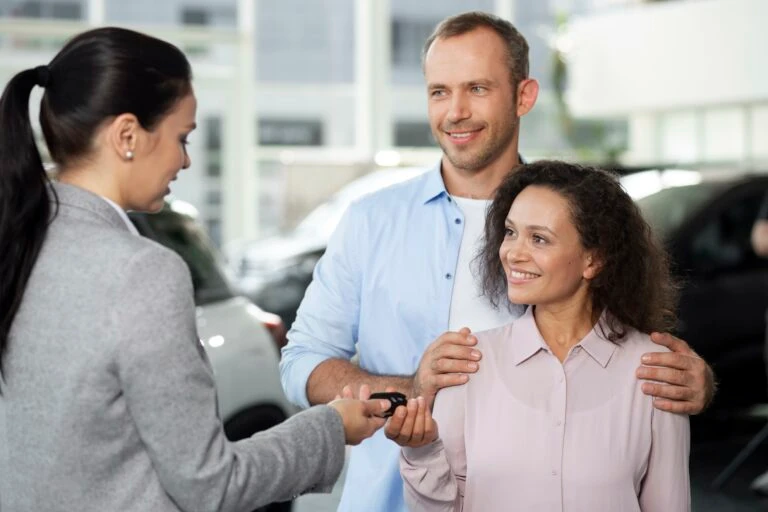 automotive dealer explaining customer